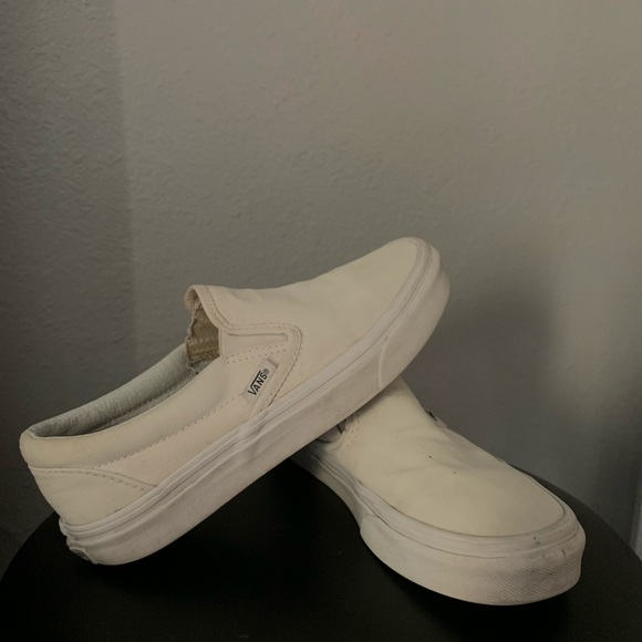 all white slip on vans